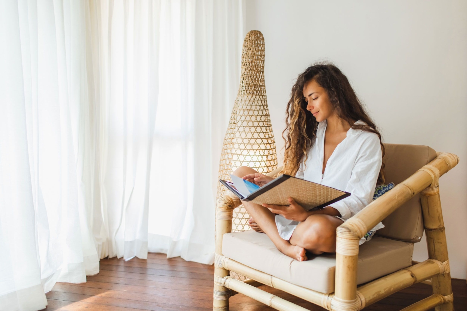 person sitting on a chair luxury apartments near houston