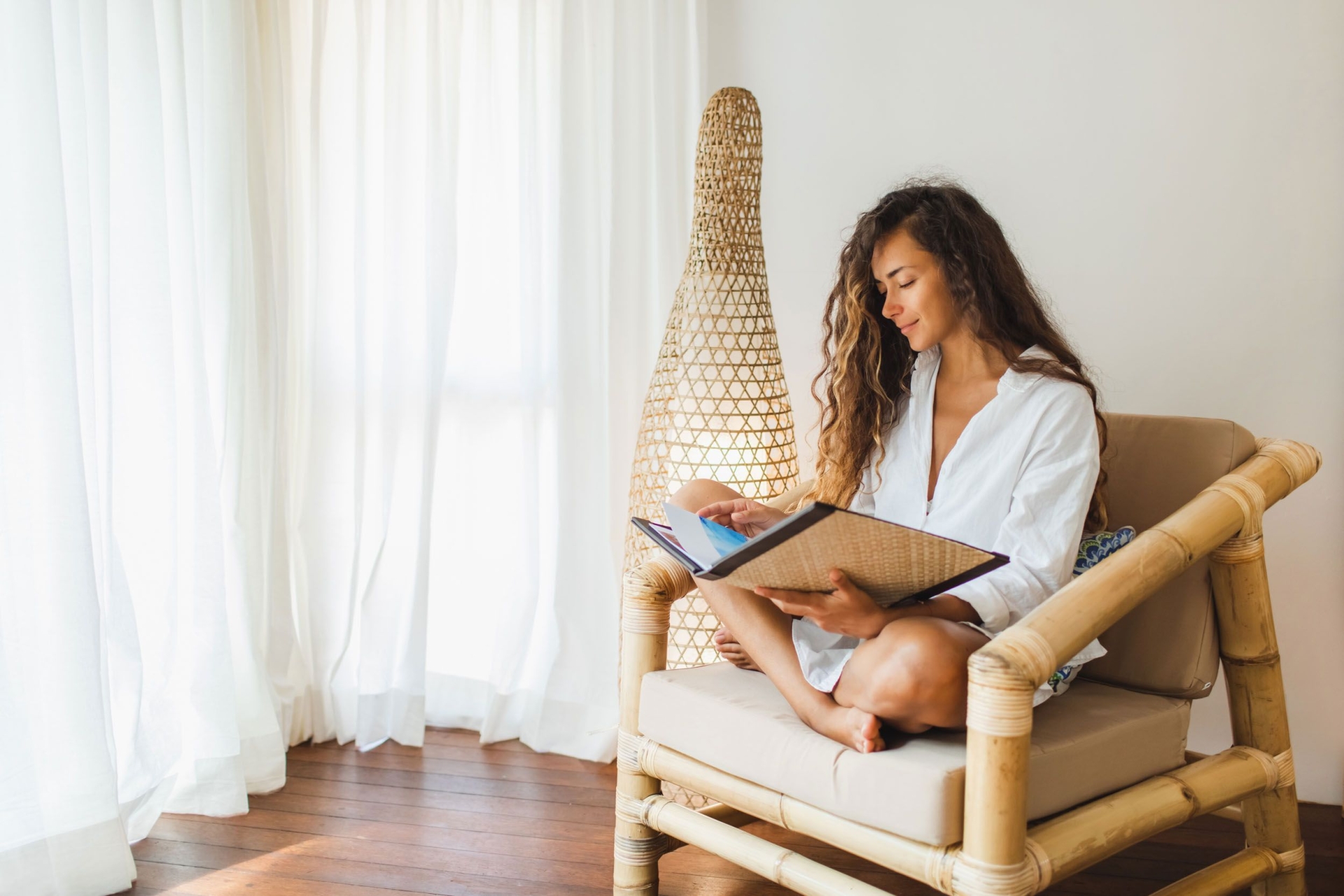 person sitting on a chair luxury apartments near houston